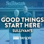 Two men standing in front of a brick building with a sign "Sullivan's Castle Island". Overlaid text reads "Good things start here. Sullivan's".
