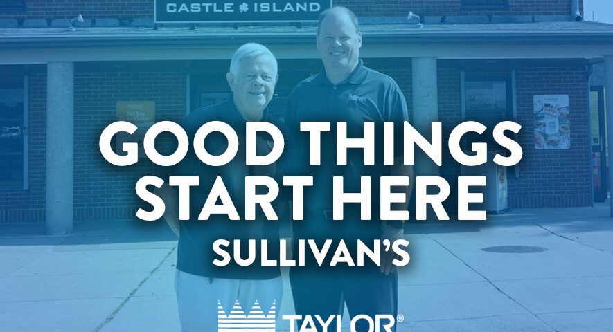Two men standing in front of a brick building with a sign "Sullivan's Castle Island". Overlaid text reads "Good things start here. Sullivan's".
